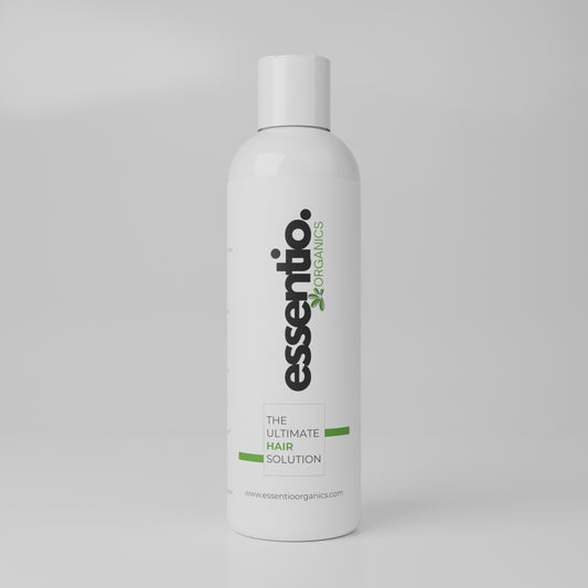 essentio organics hair oil bottle